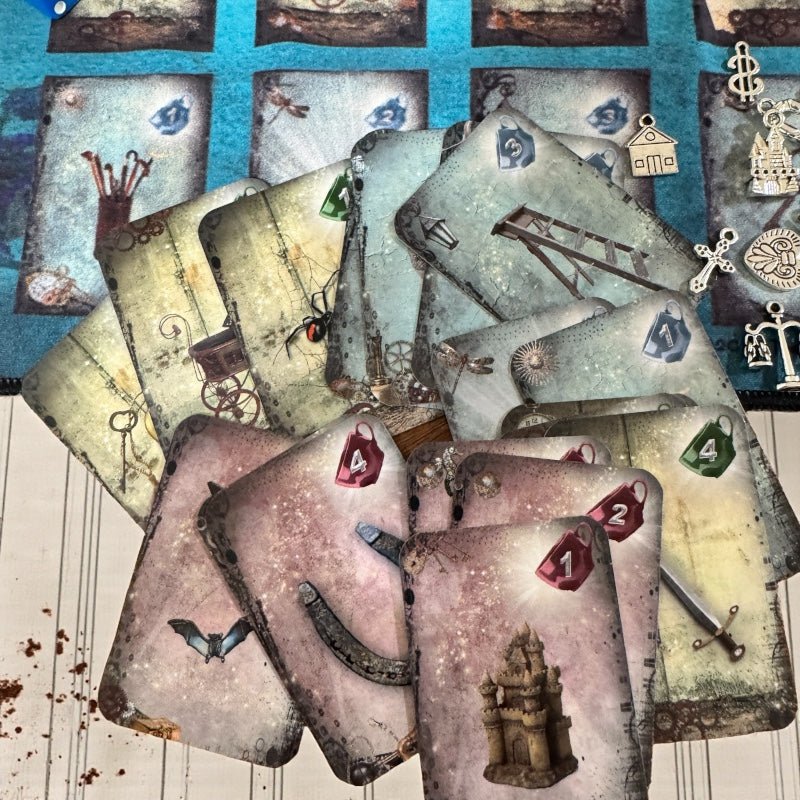 Close-up of Curiosi-tea Magic and Mystery oracle cards showing mystical illustrations