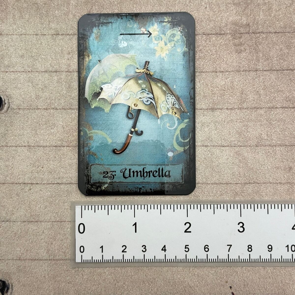 MysTEAcal tea leaf reading cards spread out on a table