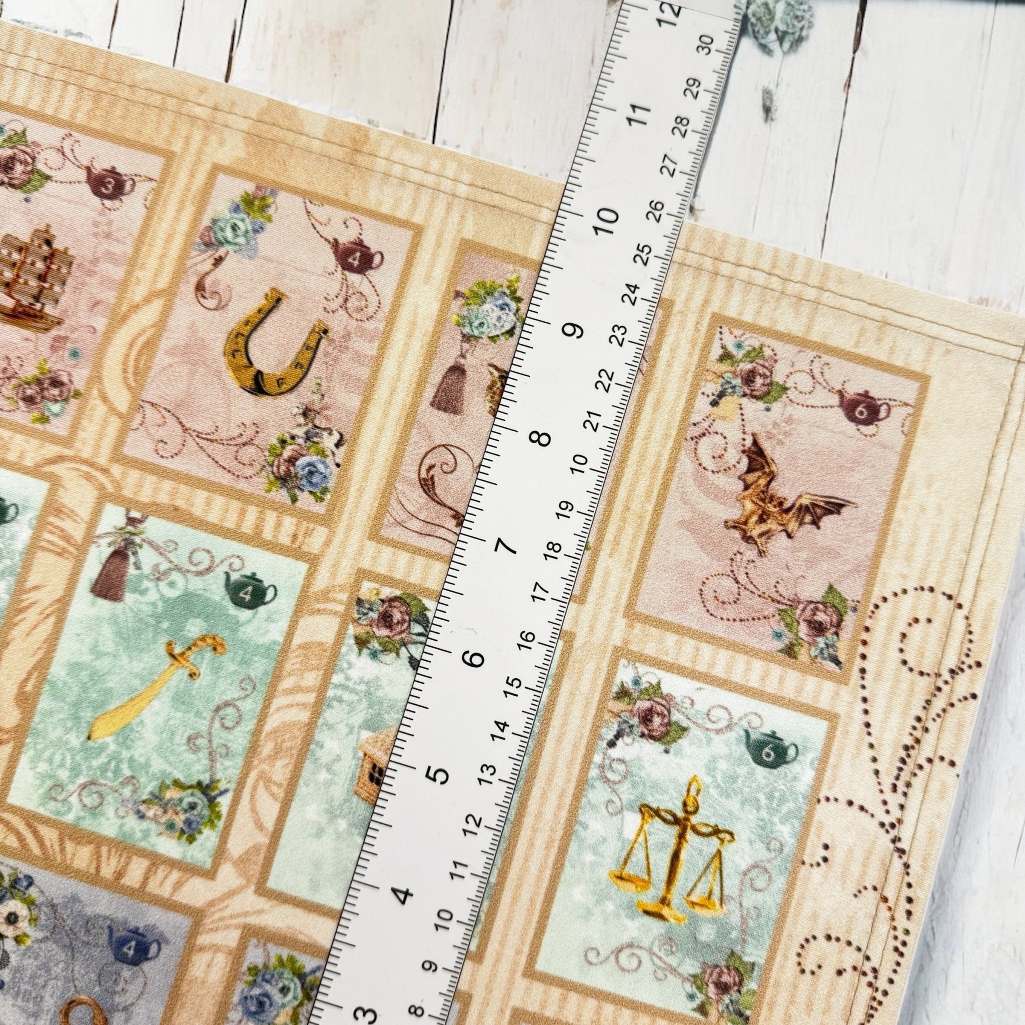 This is a full divination system all in one travel kit tin.  It has washable spandex mat and 18 cards and 18 charms and 3 dice.