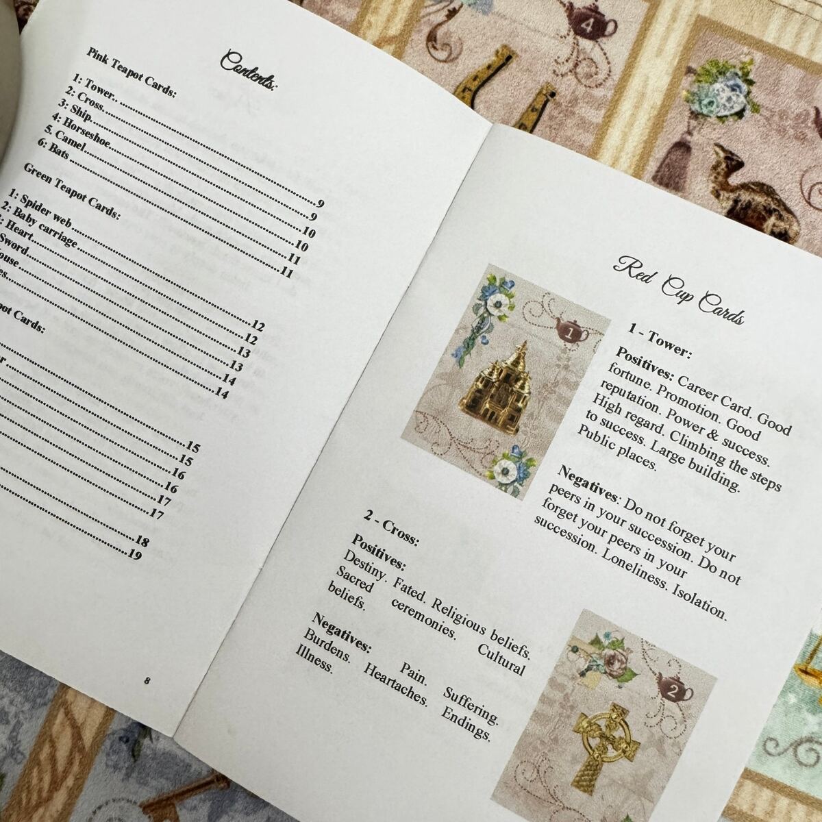 Curiosi-tea oracle cards and charms kit contents laid out