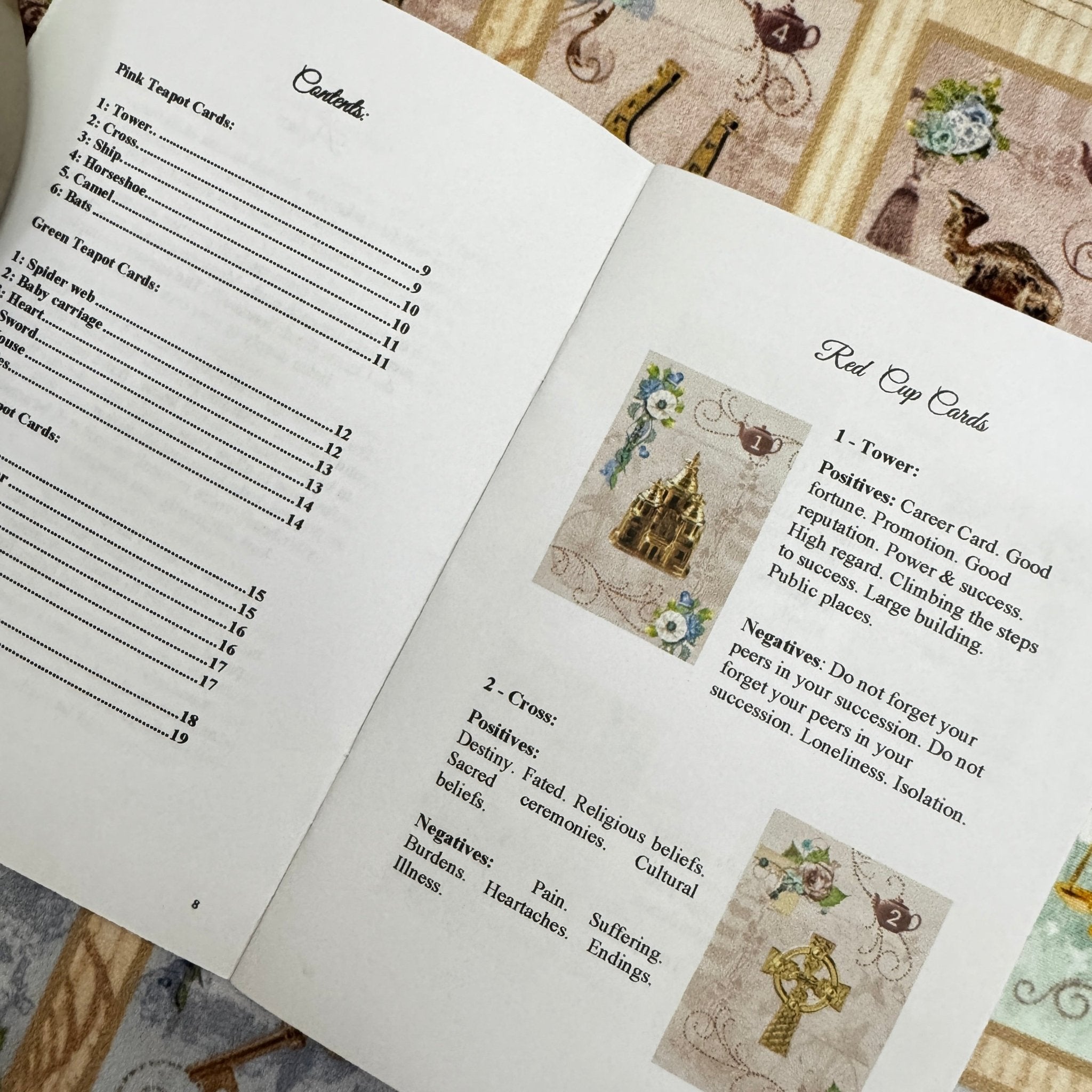 This is a full divination system all in one travel kit tin.  It has washable spandex mat and 18 cards and 18 charms and 3 dice.