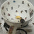 Whimsical cat-themed teacup and saucer set for tea leaf reading and mystical practices