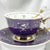 Luxury gold-accented teacup with permanent symbols inside, perfect for tea leaf reading and divination, curated by Karin in her home studio."