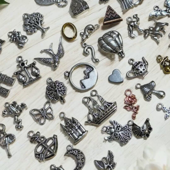 charm casting kit for divination.  Includes 10 free print at home casting sheets and free course in how to learn divination using charms.
