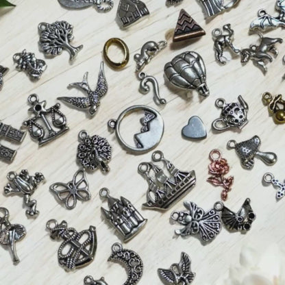 charm casting kit for divination.  Includes 10 free print at home casting sheets and free course in how to learn divination using charms.