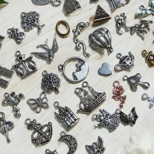 charm casting kit for divination.  Includes 10 free print at home casting sheets and free course in how to learn divination using charms.