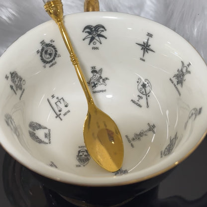 Jet Black and gold tea cup and saucer set. 22 Major Arcana Tarot Symbols. Tea Leaf Reading Set