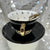 Video Black bat fortune telling teacup and saucer set with bat inside the teacup and also on the saucer. 