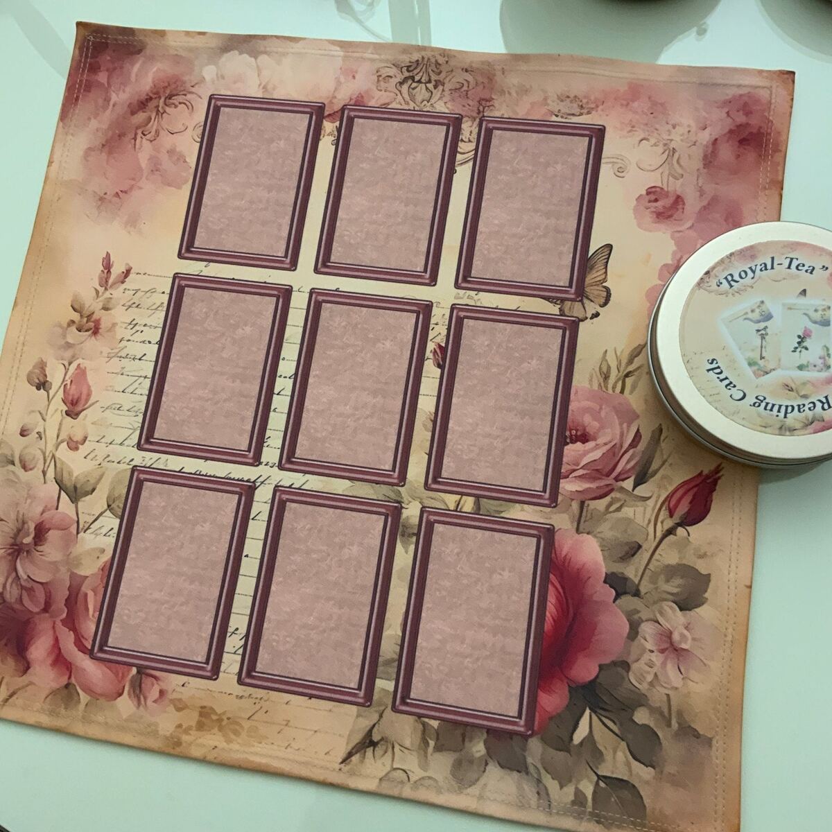 Royal-Tea oracle cards fanned out showing floral card fronts