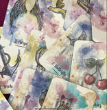 A soft watercolor deck titled “Sereni-Tea” with pen outline images, displayed in a spread showing vibrant, detailed cards.  