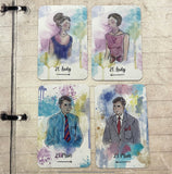 A soft watercolor deck titled “Sereni-Tea” with pen outline images, displayed in a spread showing vibrant, detailed cards.  