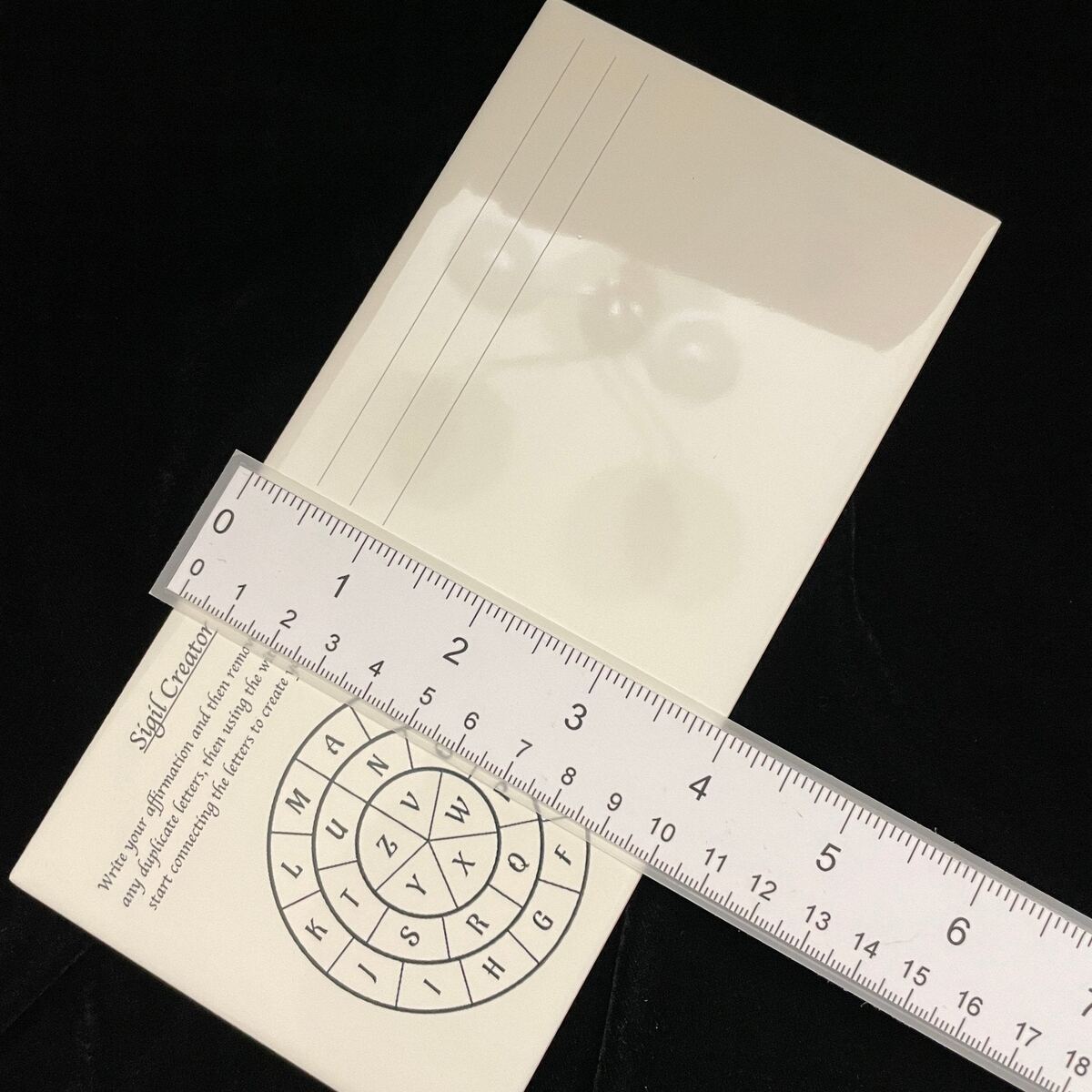 Ceramic Sigil Creator displayed alongside its gift packaging