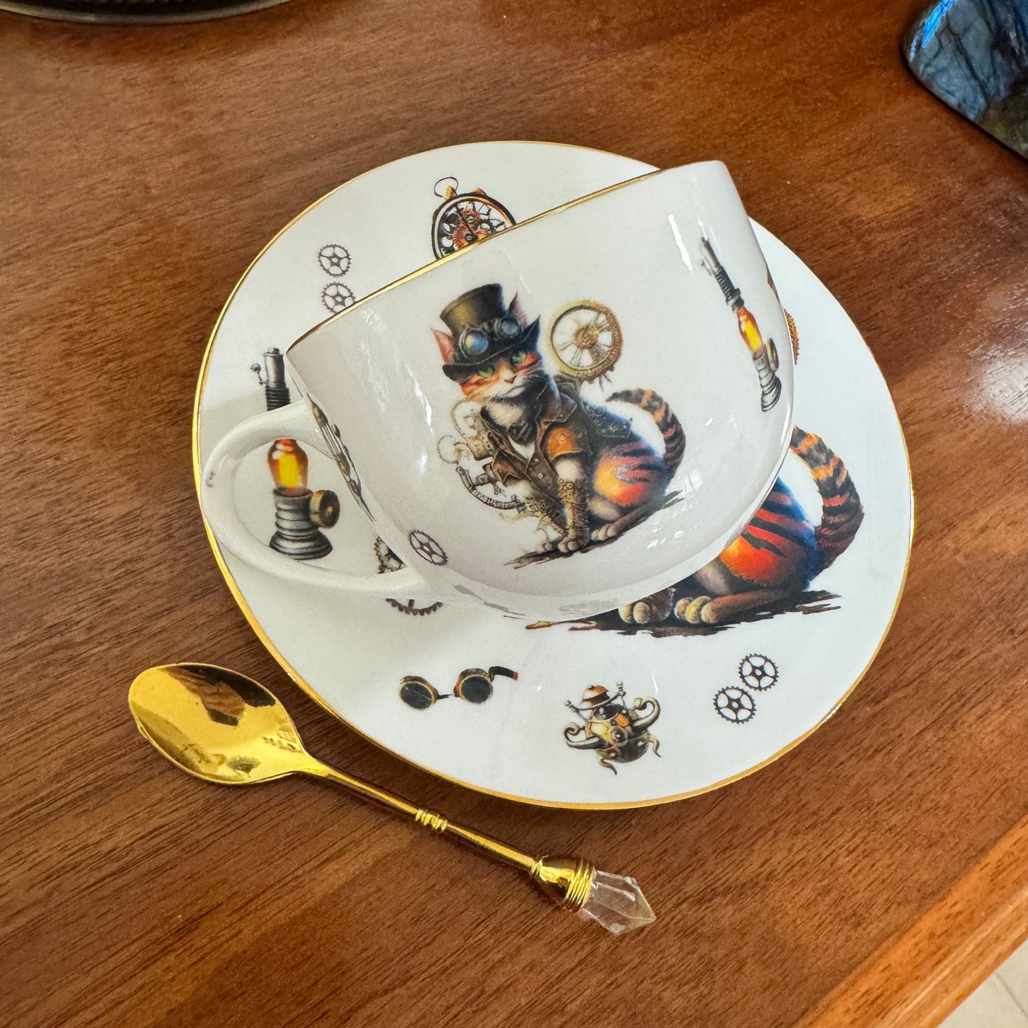 Left side view of steampunk cat teacup in his top hat