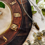 Reversible teacup mat for charm casting.  Washable spandex. Includes tigers eye pendulum and guidebook.