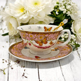 Luxury gold-accented teacup with permanent symbols inside, perfect for tea leaf reading and divination, curated by Karin in her home studio