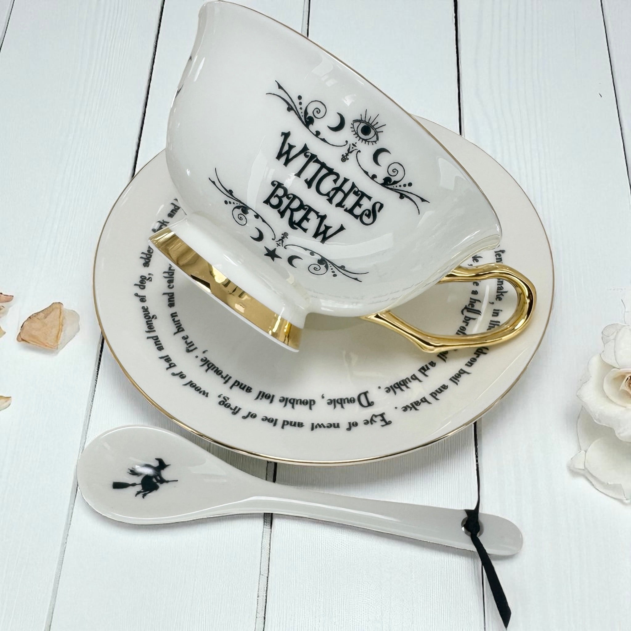 Fortune telling cup designed with illustrated symbols and instructions to simplify tea leaf interpretation.