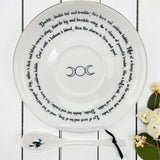 Styled image of the Witches Brew saucer being used for symbolic divination with tea leaves.