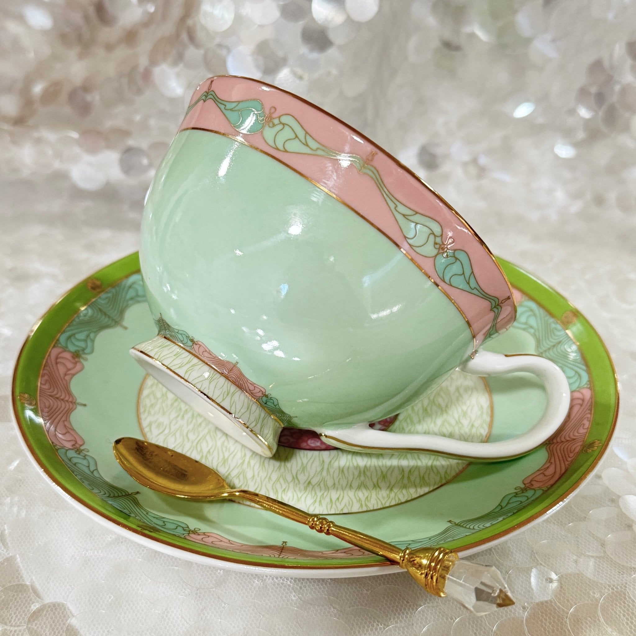 Mint green tea set that is wizard of Oz theme.
