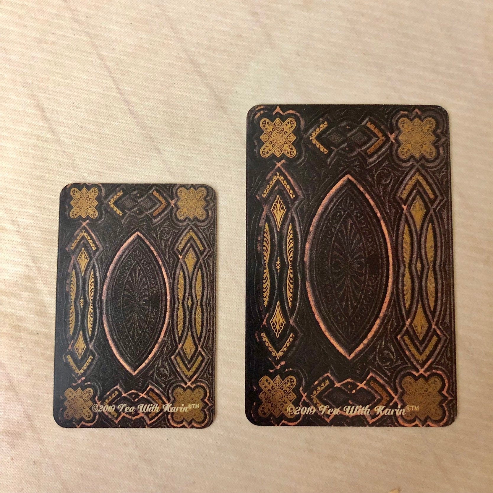 Set of 50 professionally printed tea leaf reading cards with vibrant symbols, included guidebook, and eco-friendly cotton bag, designed for divination, tarot, and fortune-telling.