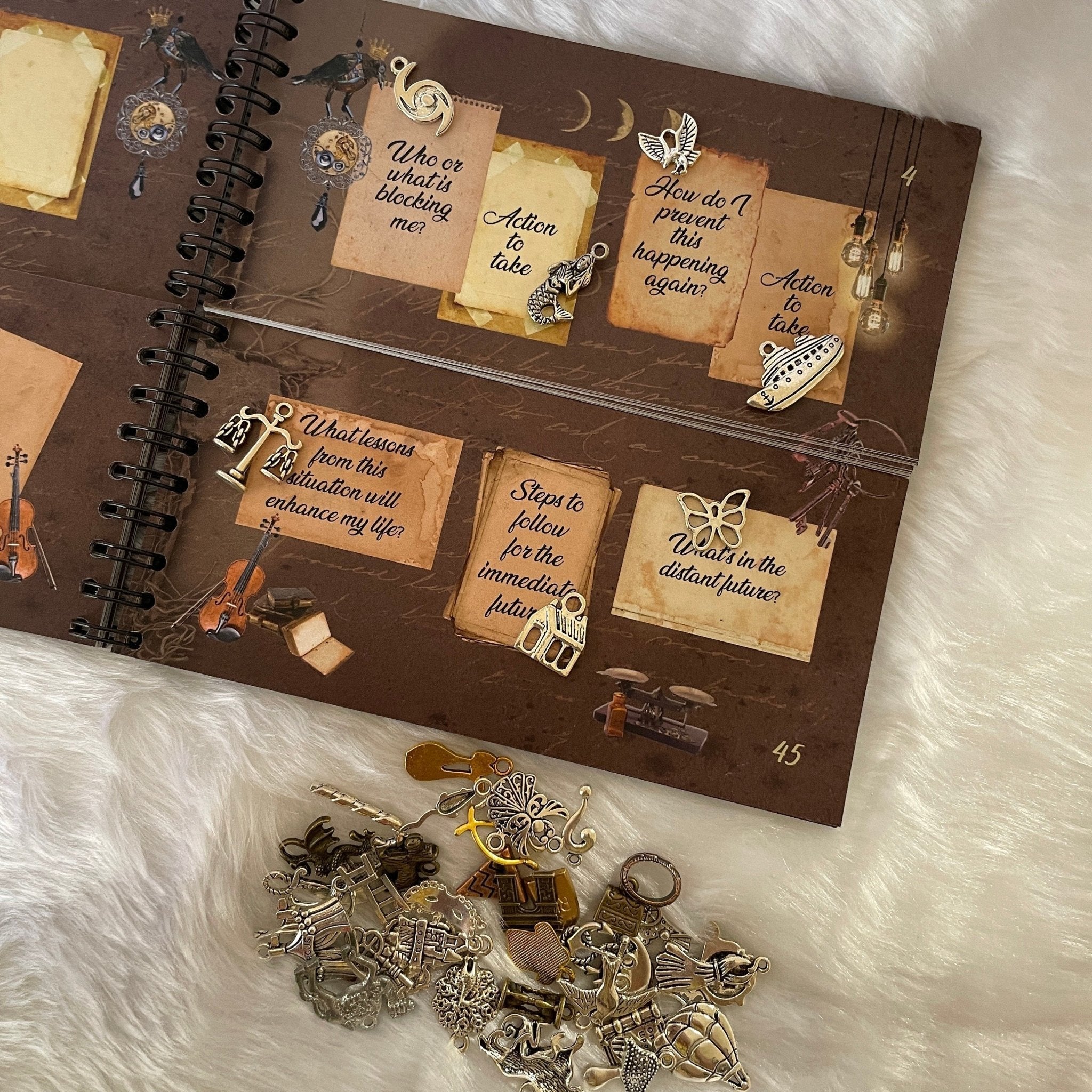 Divination Divided book open showing customisable layout grid pages