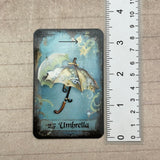 MysTEAcal Tea Leaf Reading Cards guidebook showing symbol meanings and reading instructions
