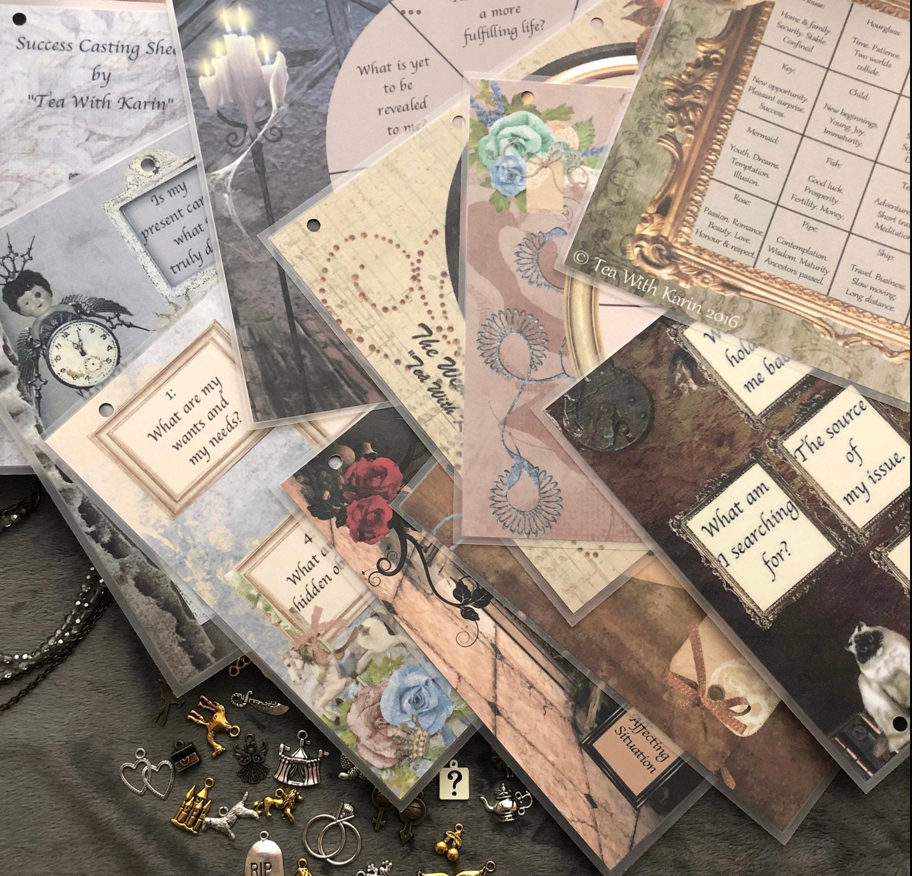 Tea leaf reading card deck with 45 high-gloss, 300gsm cards featuring unique symbols, a symbol dictionary, and a gold teaspoon, presented in a cotton drawstring bag